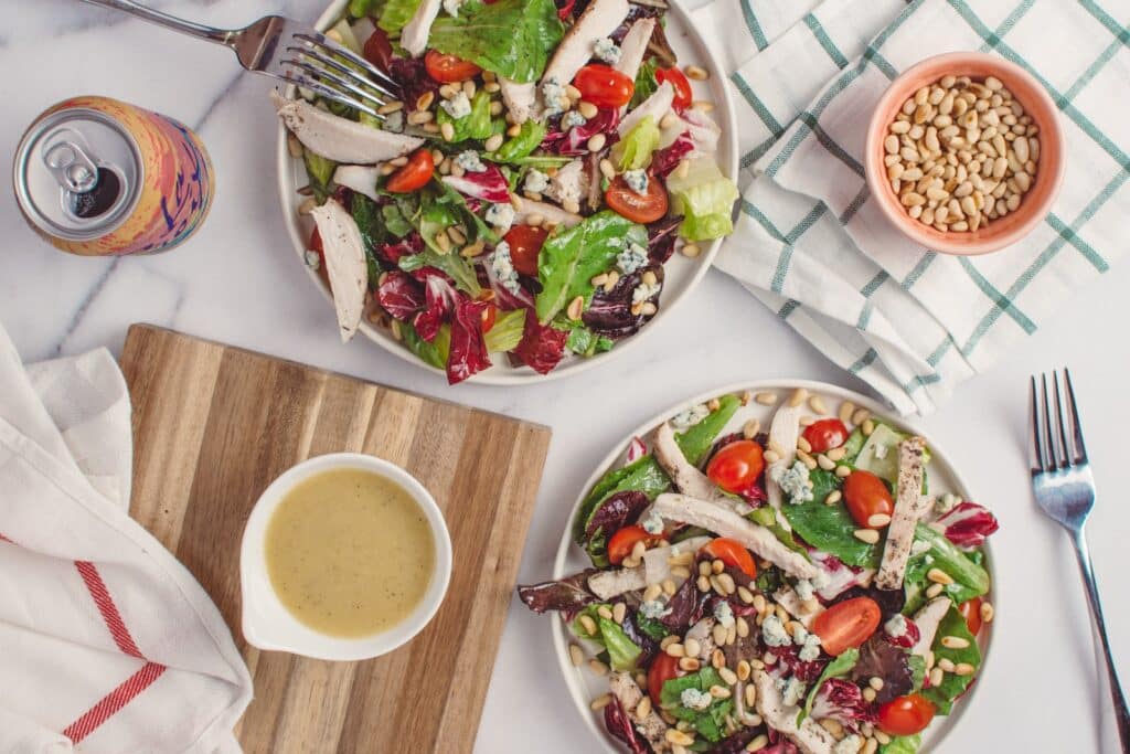 flat lay photography of two bowls of fruit and vegetable salad - Low-Carb Diet