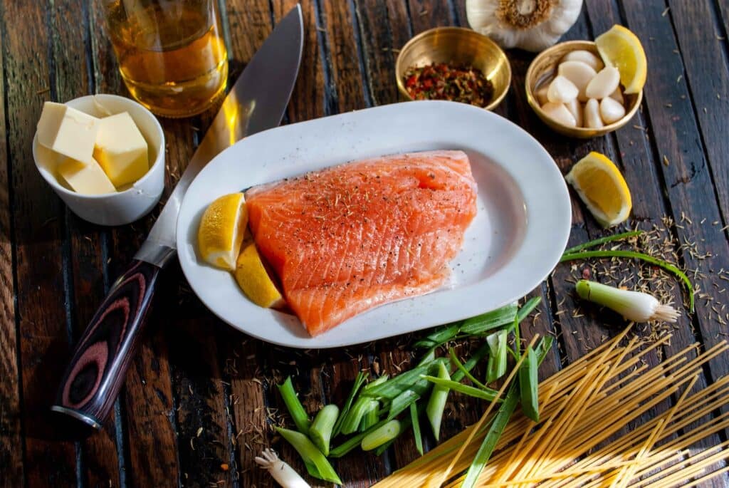 flat lay photography of raw salmon fish Low-Carb Diet