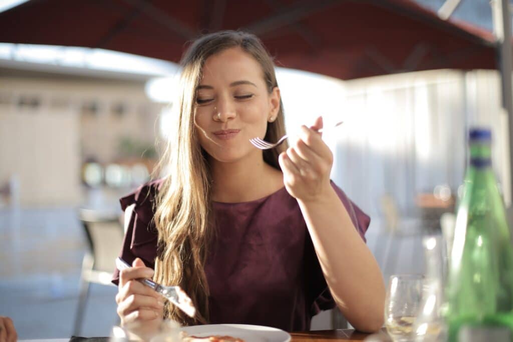 Woman in Purple Eating - Keto Diet