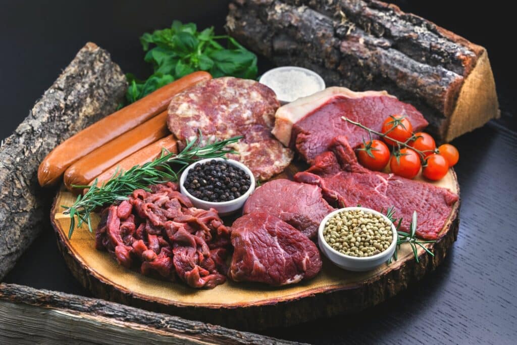 raw meat on white ceramic plate Prioritize Protein